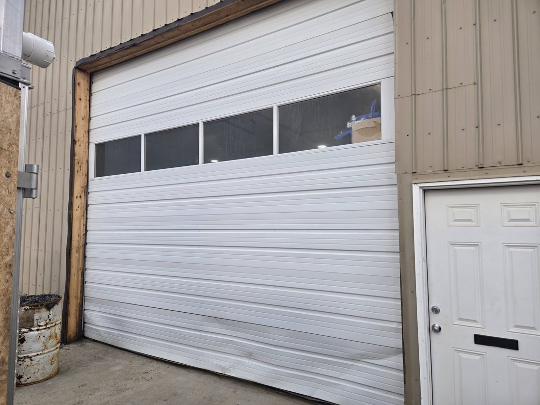 Commercial garage door before replacement